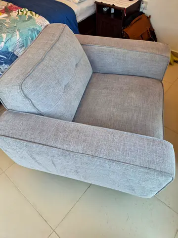 Light grey upholstered single armchair - good condition