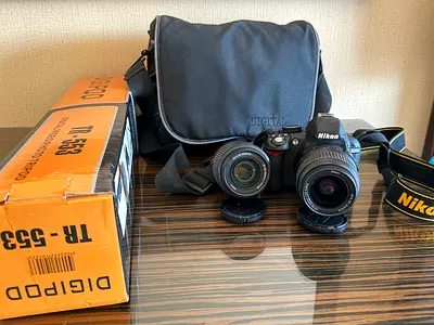 Nikon D3100 DSLR Camera with Dual Lens Kit and Tripod Bundle