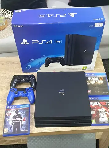 Sony PS4 Pro with 2 Controllers + 5 Games, Original Box
