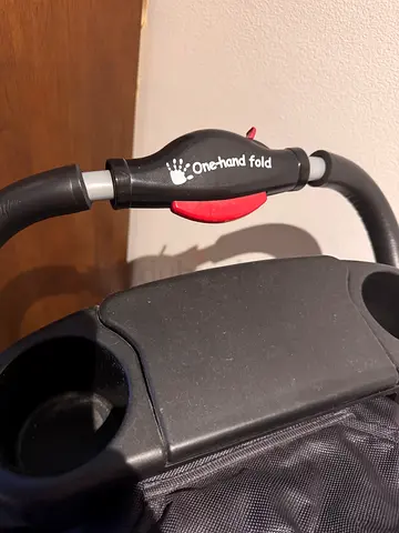 Stroller with snack tray and cup holders - one-hand fold