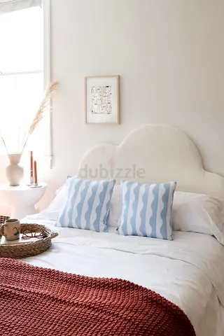 Curved Upholstered Cream Headboard -