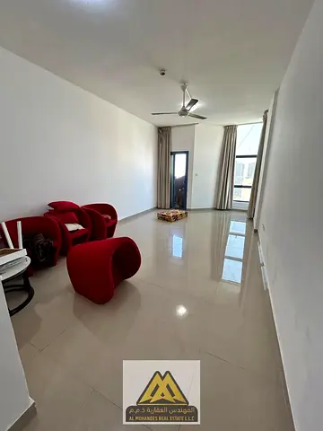 Two bedrooms and a large living room with a balcony in Tower Al Nuaimiya C, close to all services and main roads.