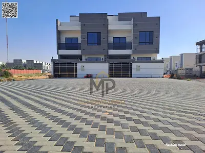 Townhouse_on a main road|large front setback of 20 meters|5 master rooms, majlis, 2halls, roof|central A\C|freehold| 0 registration fees|negotiable.