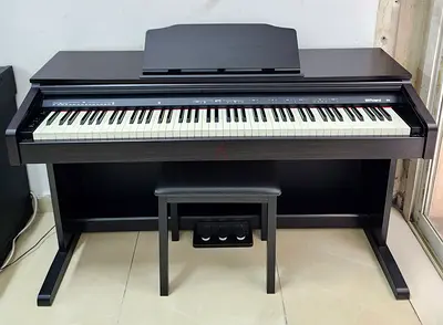 The Roland RP30 is a budget-friendly, 88-key digital upright piano designed for beginners, students,