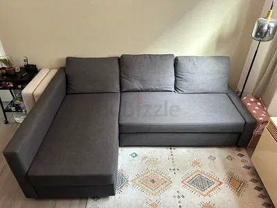 Grey L-shaped Fabric Sofa Bed - Good Condition