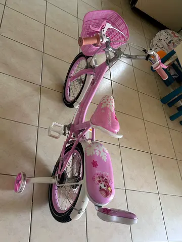 Pink Kids Bicycle with training wheels