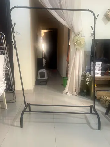 Sturdy Black Freestanding Clothes Garment Rack with Wheels