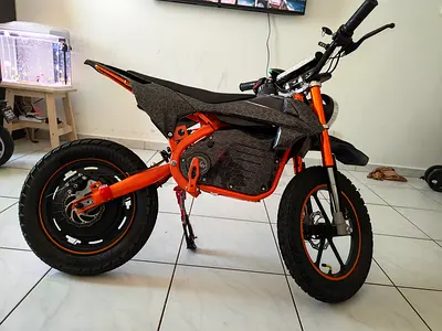 Electric dirt-style mini bike — single owner, good condition