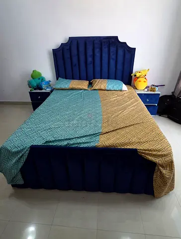 Bed with side tables