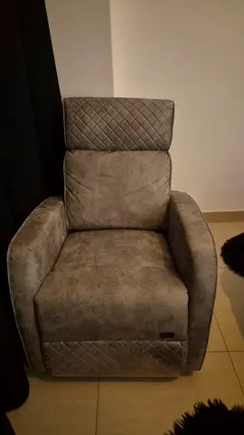 Barely used grey chair used for breastfeeding. Electric controlled