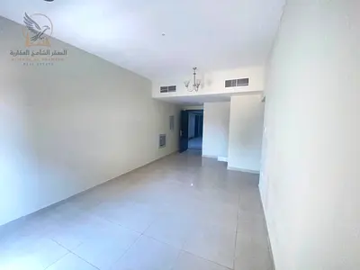 Annual Rent in Al Jurf 3 Ajman | 2 Bedrooms and Living Room | Balcony | Central Air Conditioning | Private Parking | Elegant Entrance
