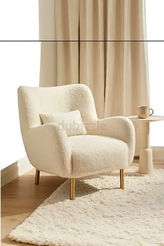 Cream boucle lounge armchair with gold legs