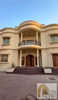 Largest villa in Al Raqaib, Ajman: 7 bedrooms, 2 living rooms, majlis, huge yard, 6-car parking, spa