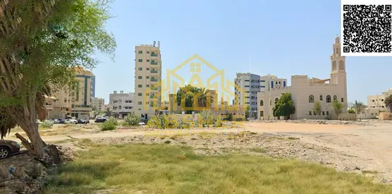 أرض سكنية تجارية للبيع في ليوارة 1 - عجمان | زاوية شارعين