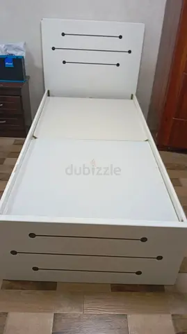 2 Single white wooden bed frame with headboard and footboard