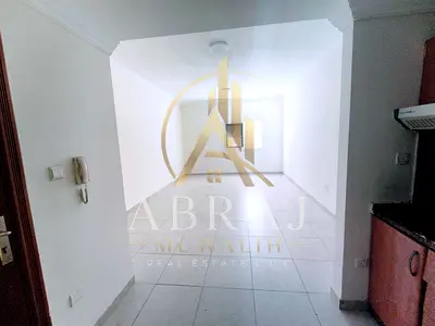 Very spacious and affordable studio with separate kitchen, central AC near Muwaileh Bus station
