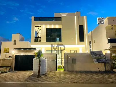 Luxury villa for sale in Al Bahia – Ajman | Street and alley + private pool