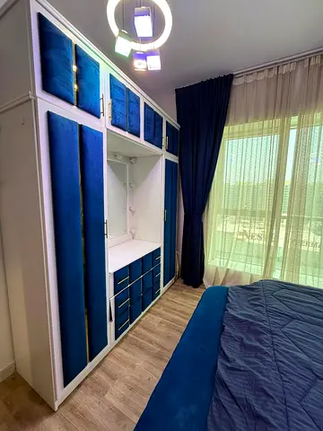 Two furnished bedrooms and a living room - excellent sea view - modern furnishings - with gym and swimming pool - close to all services