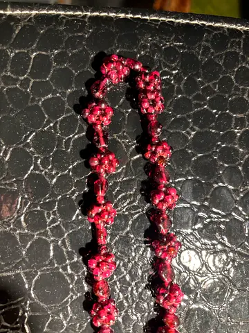 Yemeni antique handmade burgundy beaded floral necklace on neckline very unique