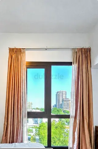 Pair of Full-Length Beige/Champagne Curtains — Good Condition with rod