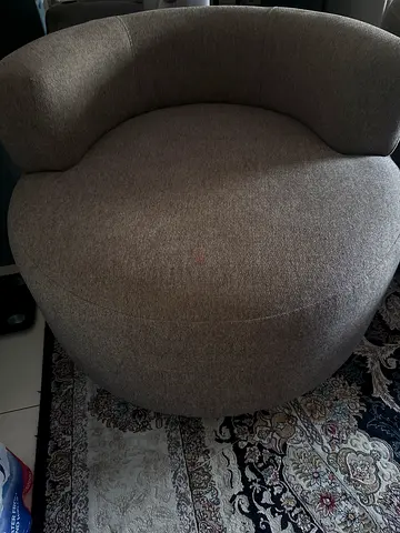 Round swivel lounge chair in gray fabric - comfortable single seat