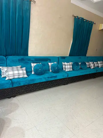 Long teal velvet Arabic-style majlis sofa set with cushions