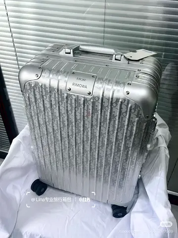 DIRO AND RIMOWA CARRY ON SUITCASE