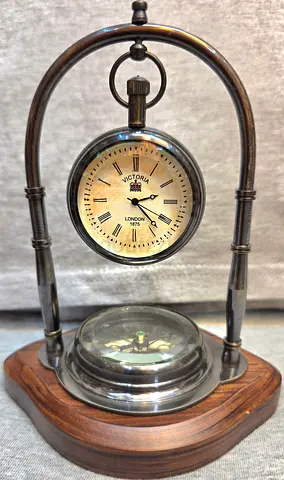 Majestic vintage table clock with compass from london for sale.