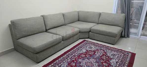 Light grey L-shaped fabric sofa - 4-seater sectional