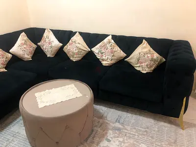 L-shaped velvet sectional sofa with ottoman -