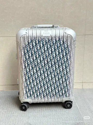 Dior and Rimowa carry on suitcase