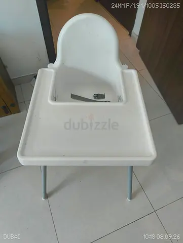 Ikea white baby high chair with tray and safety strap