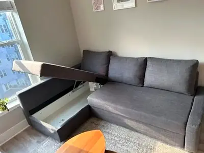 Grey L-shaped Storage Sofa Bed — Good Condition