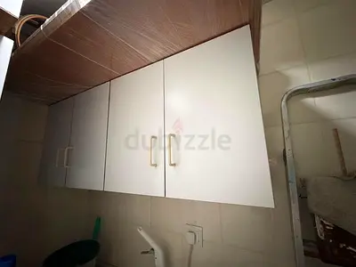 White Overhead Utility Cabinets