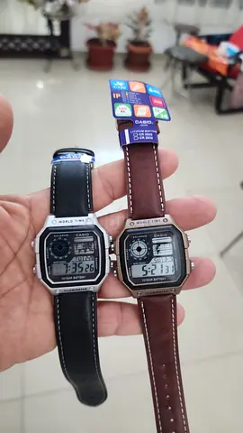 Pair of Casio Vintage Digital Watches with Leather Straps — Black & Brown