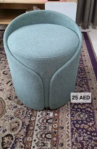 Compact round upholstered stool / ottoman - light green, good condition