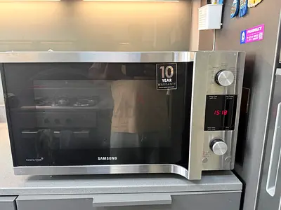 Samsung stainless steel microwave oven - excellent condition