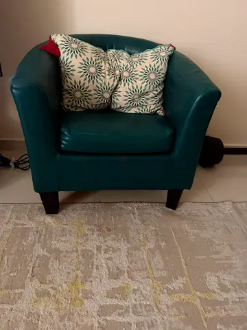 Green faux leather armchair with cushions - good condition