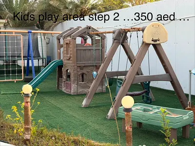 Outdoor kids playset with slide, swings and clubhouse - good condition