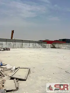**20,000 Sq Ft Open Yard with 2 shops for Rent – Sajaa Industrial Area, Sharjah | AED 260,000/Year