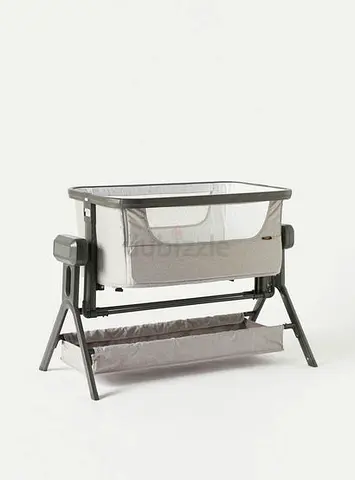 Grey Giggles Autoswing bassinet / cradle with storage shelf. Moderate use