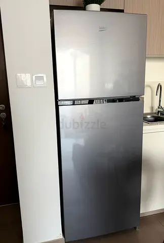 Silver two-door refrigerator with top freezer