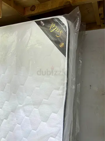 Almost-new Queen Mattress with Protective Cover (Unused)