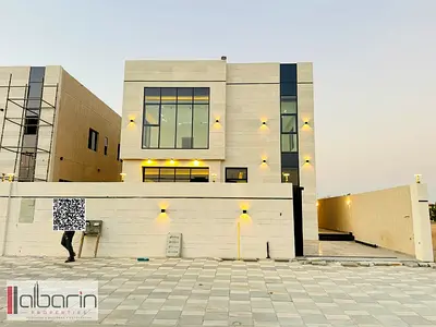 Villa for sale in the Al Zahia area of ​​Ajman, featuring 4 master bedrooms, a spacious majlis, and a living room.