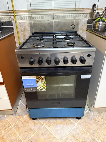 Used freestanding gas oven and stove, stainless steel, good working condition