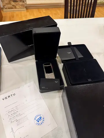 Vertu luxury feature phone in silver - used, working
