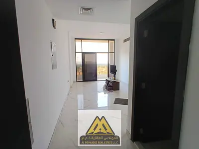 2BR in Al Mowaihat 3, master room, 2 baths, balcony, central AC, near schools, AED 45K, 4 payments.