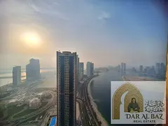 Spacious 2-bedroom + living room apartment in Al Mamzar, featuring free A/C, gym, parking, and pool 