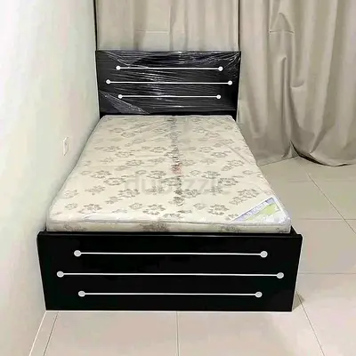 Single bed frame with mattress — good condition, black wooden design