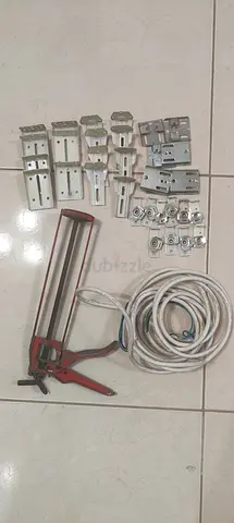 Caulking Gun, Electrical Wire, and Mounting Brackets Collection